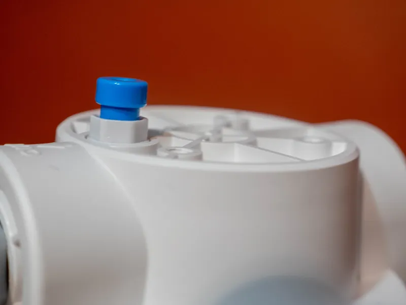 Bouton de décompression bleu